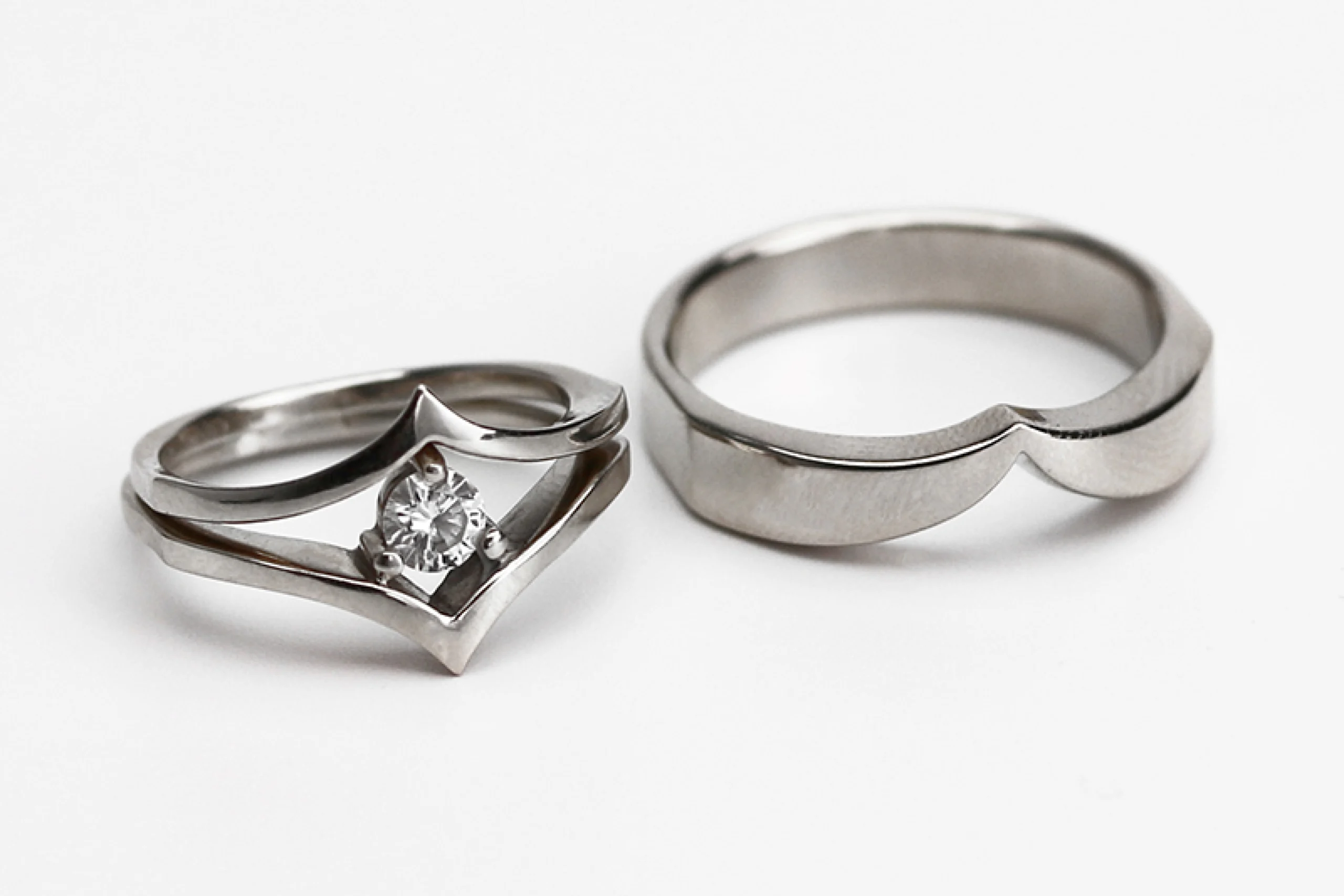 Custom wedding ring design with embedded life story symbolism